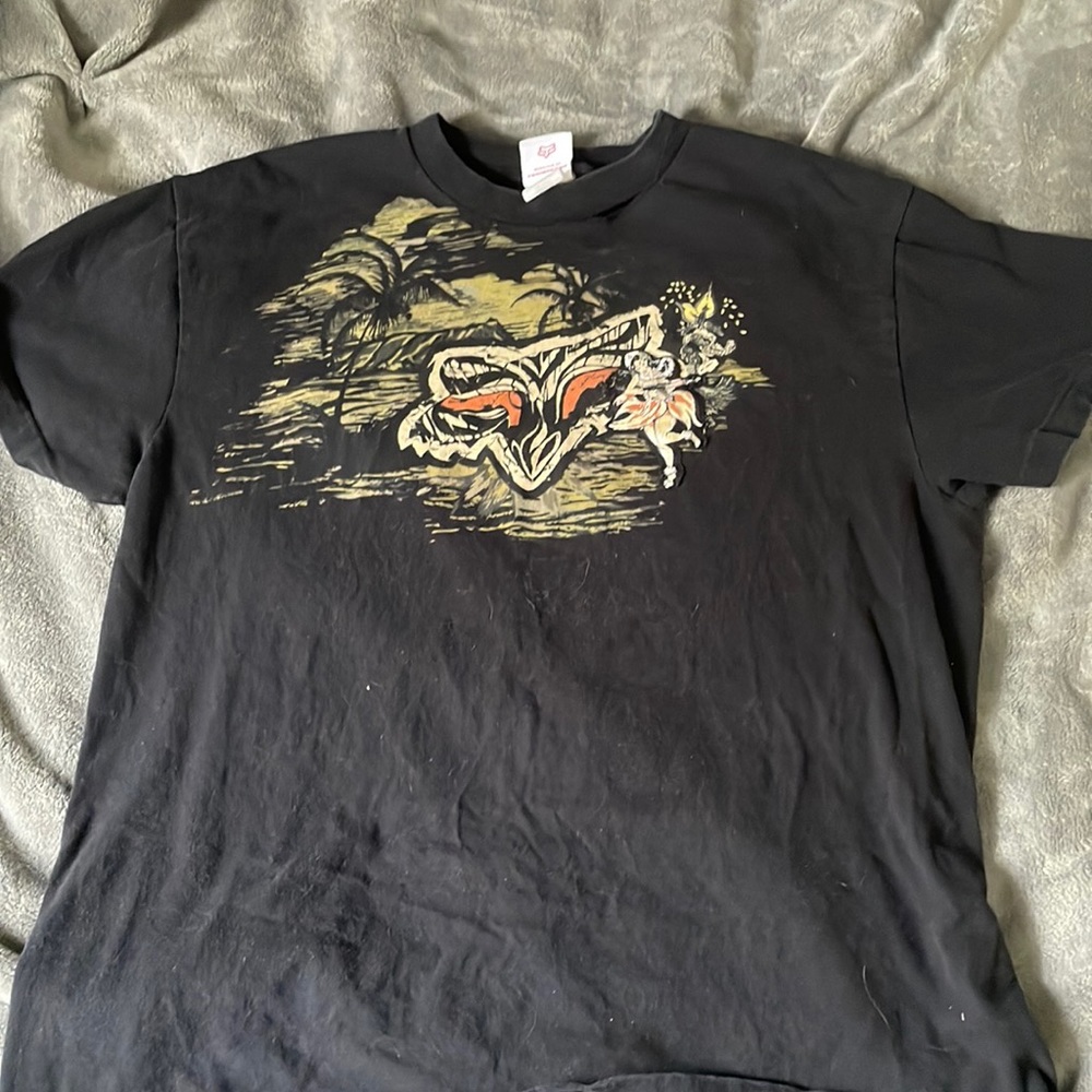 lady with AK foxhead tshirt